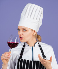 you should try this. Healthy menu and Diet. Professional wine expert. man cook holding glass of red...