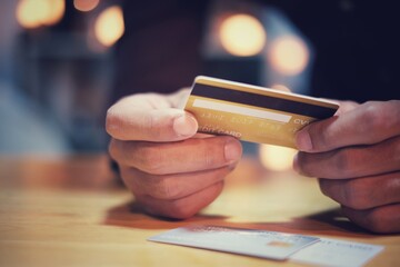 Man hands holding using credit card for online shopping payment 