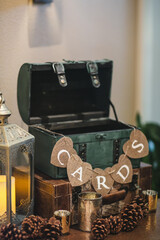 Fototapeta na wymiar open green vintage trunk for cards and gift items at wedding reception