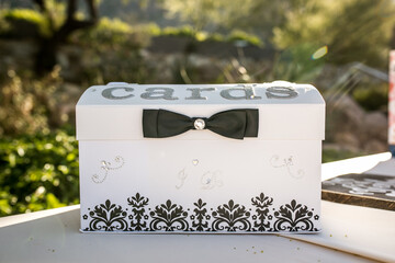 white and black box for cards and gift items at wedding reception