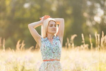 beautiful girl in a summer field