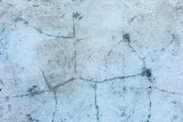 Detailed surface patterns and textures of grey concrete wall close up. Grunge background with copy space.
