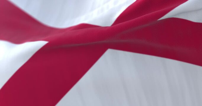 Flag of Alabama state, region of the United States, waving at wind - loop