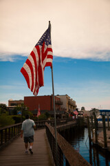 close up image of an american flag on the waterfront (taken on a 4th of july weekend in boardwalk marina of Georgetown, South Carolina)