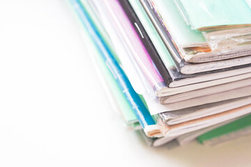 Education, a stack of notebooks on white background, copy space