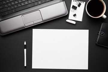 Top view of modern black office desk with laptop, notebook, pencil and a lot of things. Flat lay table layout. Copy space for text.