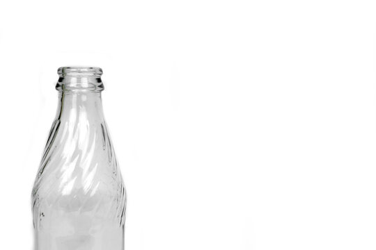 colorless empty glass bottle, on white background. glass bottle isolated