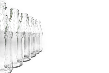 empty bottles on white background with copy space. standing close-up empty bottles with copy space.