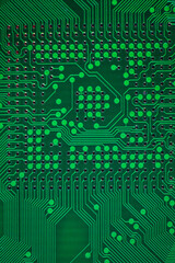 macro photo of green printed circuit board with BGA pads