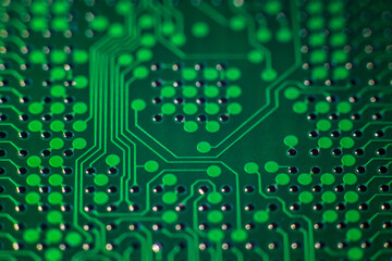 macro photo of green printed circuit board with BGA pads