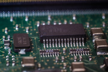 Macro photo of printed circuit board with installed SMD electronics components