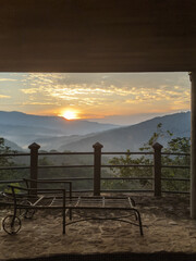 Sunrise from a balcony overlooking mountians