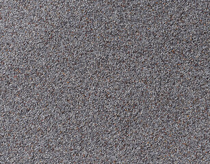 poppy seeds as texture background, top view.