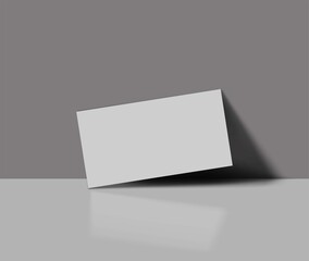 Realistic white paper card mockup on gray background. Vector illustration.