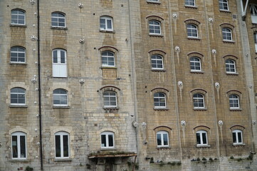 Old building wall full of windows