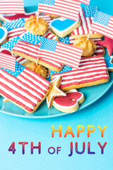 Obraz premium Happy 4th Of July - home baking cookies icing like american flag. patriotic background for US national holidays on blue 