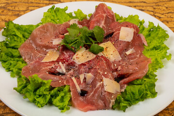 Beef carpaccio with parmesan cheese