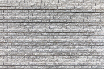 gray brick wall on the street