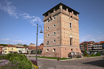 Cervia, Ravenna, Emilia-Romagna, Italy: the ancient Saint Michael tower on the canal port of the...