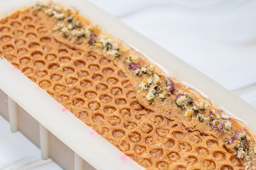 A block of handmade natural cold process soap