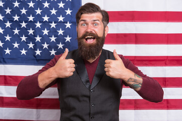 his best trip. american citizen show thumb up at usa flag. american citizen in election. happy celebration of victory. bearded hipster man being patriotic for usa. american education reform in july 4