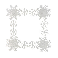 Christmas frame. Christmas decorations and snowflakes on isolated white background. Snowflakes frame with copy space