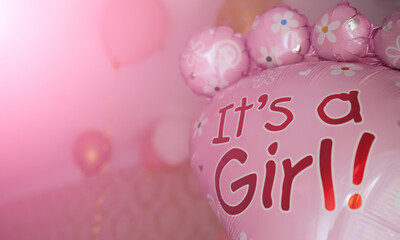 Pink balloon with text it's a girl gender reveal party. Gender party