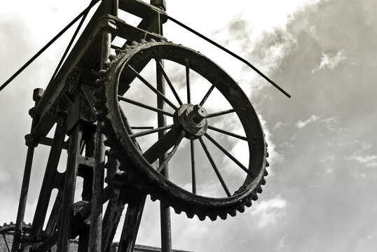 Lifting tower and cloudy sky