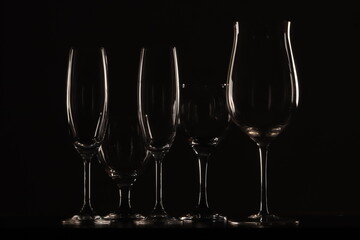champagne glasses on black background