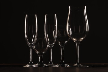 champagne glasses on black background