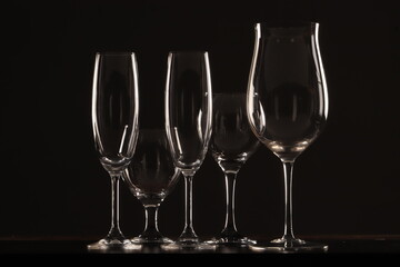 champagne glasses on black background