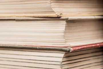 Old yellowed stack of books