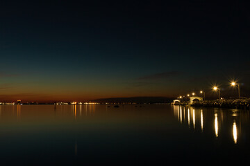 Fototapeta na wymiar Night reflections on the Bay