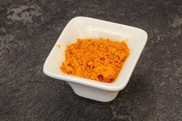 Tumeric powder in the bowl