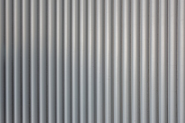 abstract background of an embossed grey plastic surface close up
