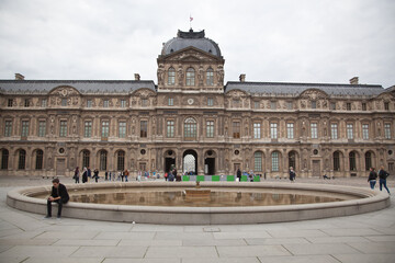 Fototapeta na wymiar Paris,France-30.May.2014:Louvre museum - France - Paris at a sunny day