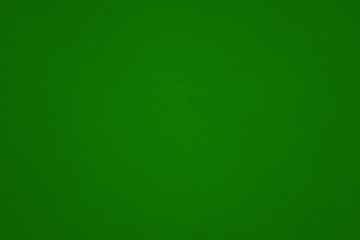 Green paper with texture. Green textured paper background