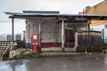 Old desolate gas station in small vilage in mountains, Lebanon