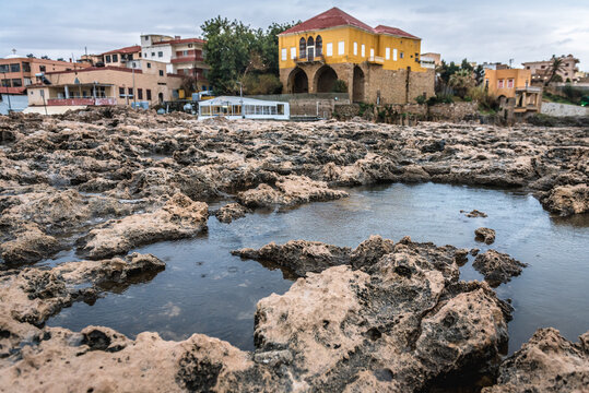 Rocks on the remains of Phoenician wall in historic Batroun coastal city in Batroun District, Lebanon