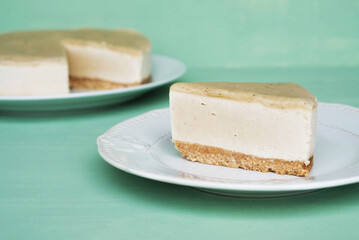 Vegan cheesecake with a salted caramel fudge sauce topping.