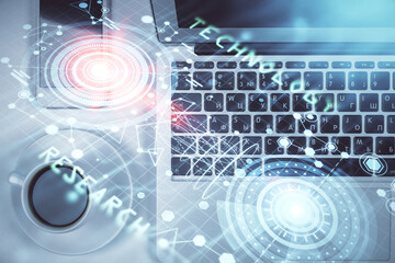 Multi exposure of data theme drawing hologram over topview work desk background with computer. Concept of technology.