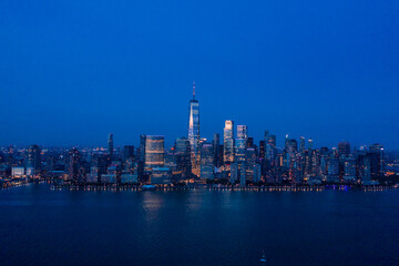 Fototapeta na wymiar Aerial view of lower Manhattan at dusk from Hudson river. 