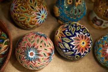 Fototapeta na wymiar Ceramic product decoration flower ball traditional Ukrainian souvenir amulet