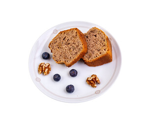 Slices of Homemade Walnut Cake with Blueberries and Walnuts