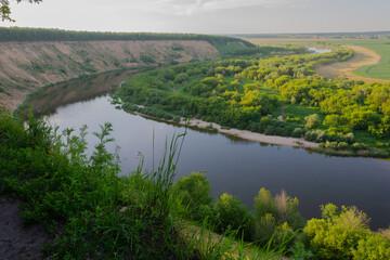 Obraz premium Panoramic view of the evening river