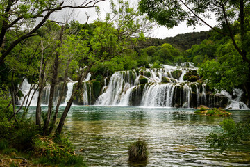 Beautiful Krka waterfalls with a lush green trees and turquoise water. Croatia, 28th April 2015.