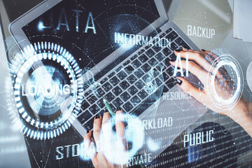 Double exposure of woman hands working on computer and data theme hologram drawing. Top View. Technology concept.