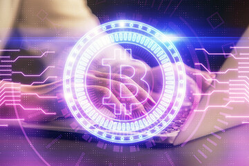 Double exposure of woman hands typing on computer and crypto market theme hologram drawing. Blockchain concept.