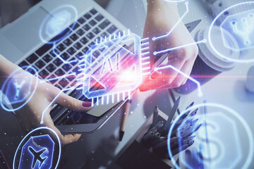 Multi exposure of woman hands working on computer and data theme hologram drawing. Tech concept.