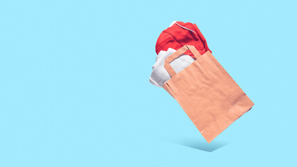 Flying shopping paper bag with purchases. Concept of consumerism, ease of shopping. Copy space trend pastel colors.